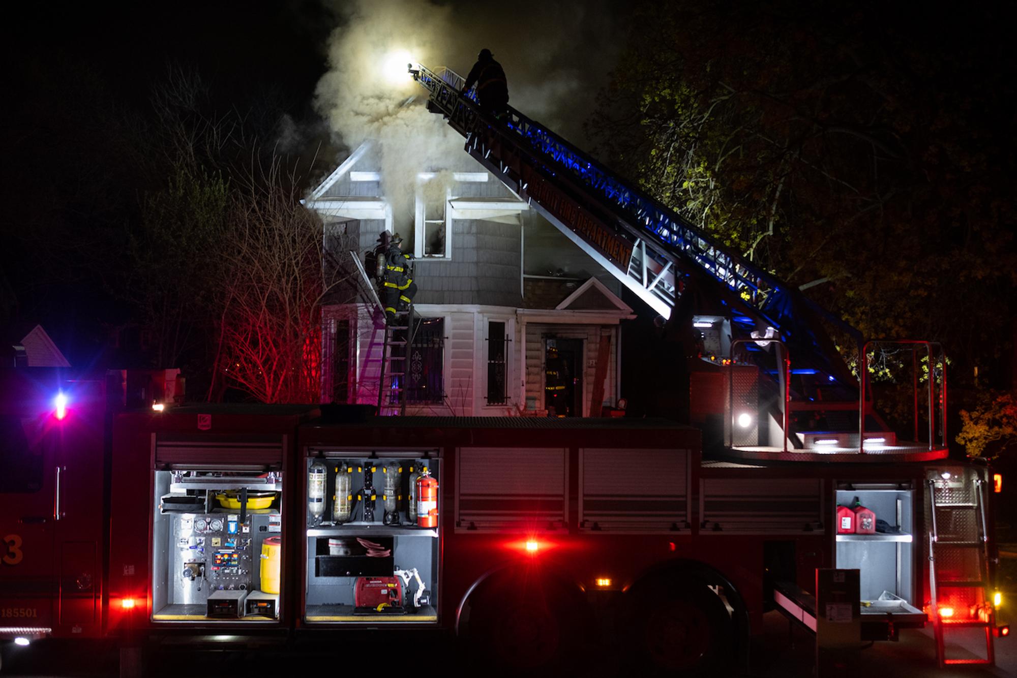 A late night fire brought neighbors outside and firefighters to the scene on Avis St. at Woodmere in Southwest Detroit.Taken by Erik Paul Howard for WDET