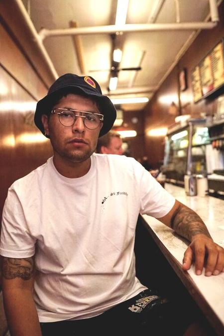 Visual artist Freddy Diaz photographed at the counter of Duly's Place coney island in Southwest Detroit.Emilio Cuevas