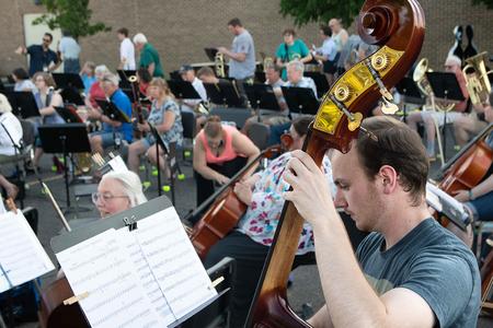 Bassist Michael Visniski plays with the Fenton Community Orchestra on Thursday, June 10 behind the high school for an informal gathering. It was the first such meeting since the pandemic started.Tim Jagielo/WDET