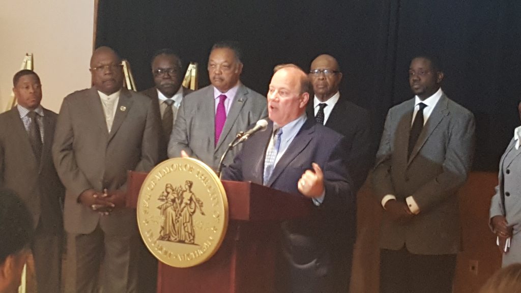 Mayor Mike Duggan and the Reverend Jesse Jackson