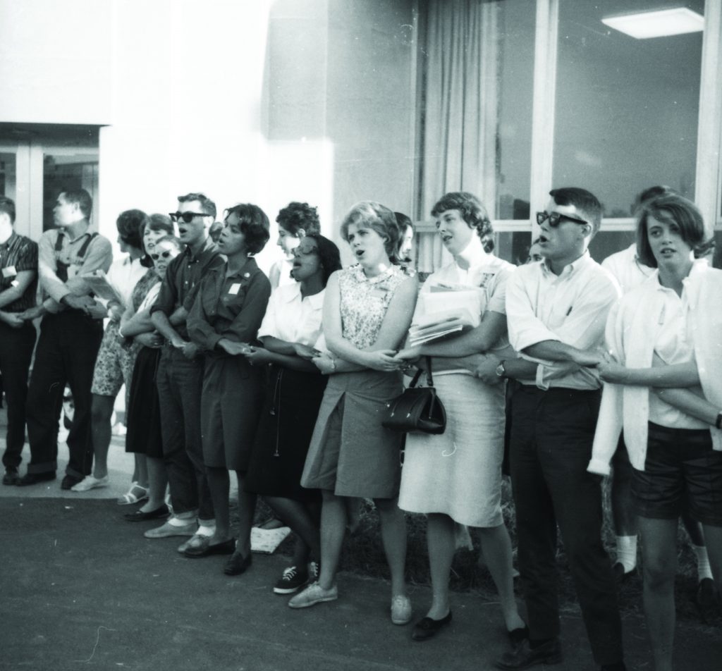 Civil rights workers singing We Shall Overcome