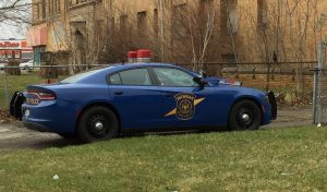 Michigan State Police car parked on the grass
