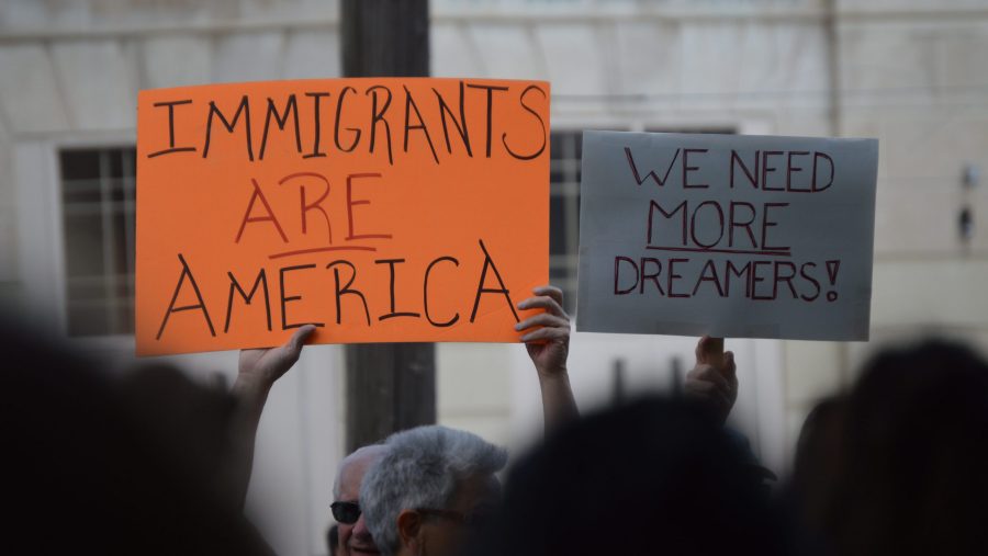 FILE - Protesters rally in Detroit against the Department of Homeland Security's order to phase out the Deferred Action for Childhood Arrivals (DACA) program.