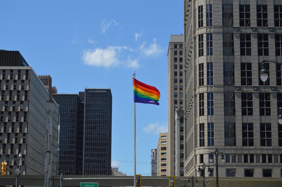 rainbow pride flag waves over Detroit