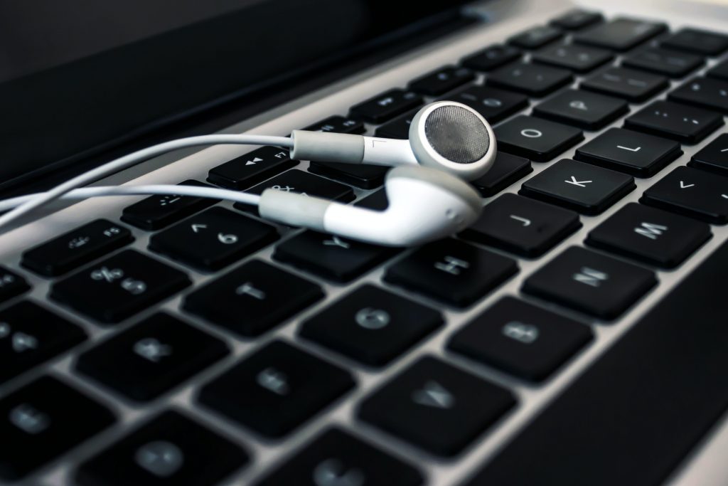 Earbuds on keyboard