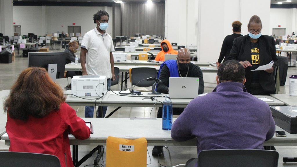 poll workers absentee ballot stubs counting