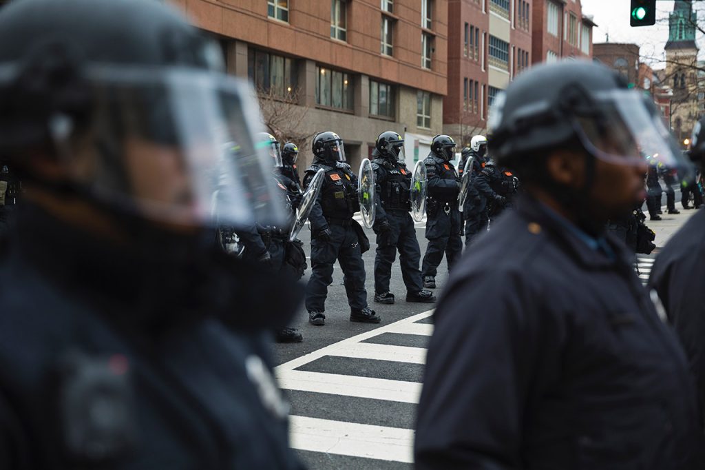 Police in riot gear stock image