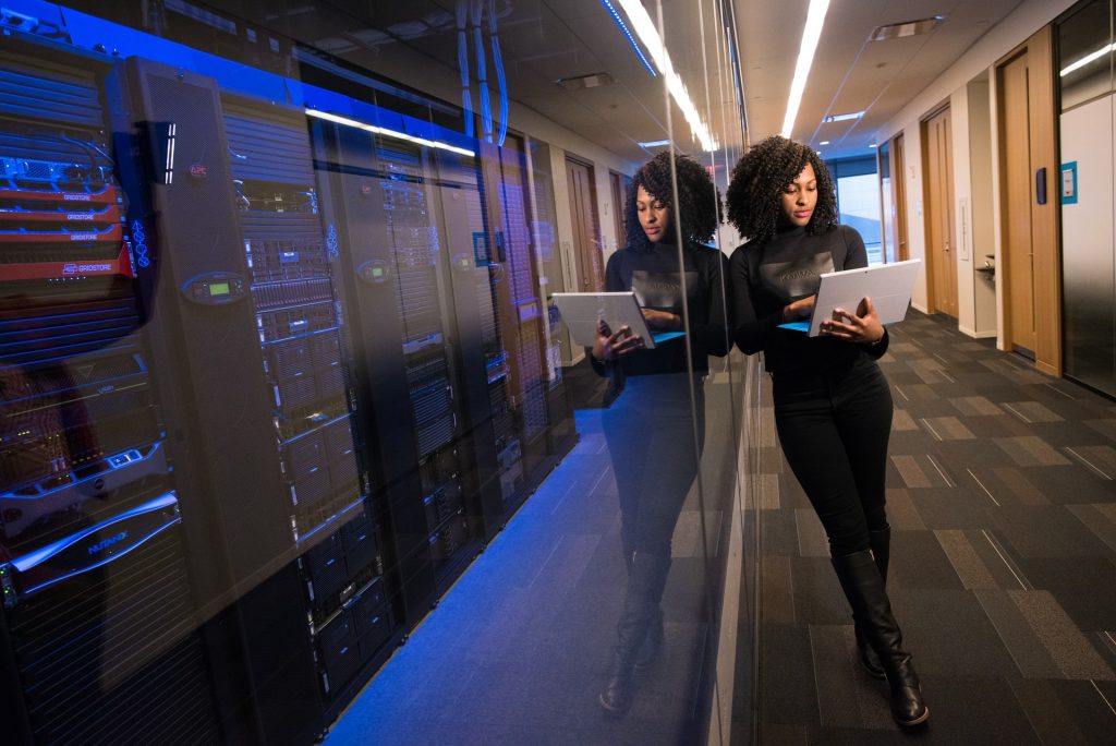 woman at computer during STEM conference