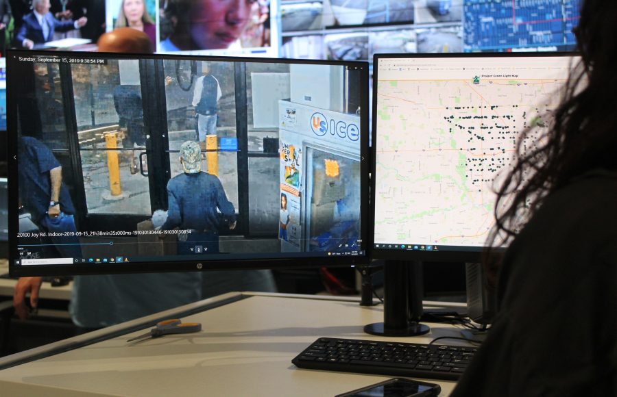 Woman monitors security footage at Detroit's Real Time Crime Center