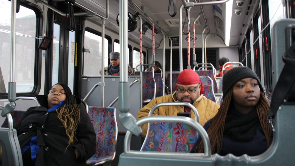 interior of a buss with passengers
