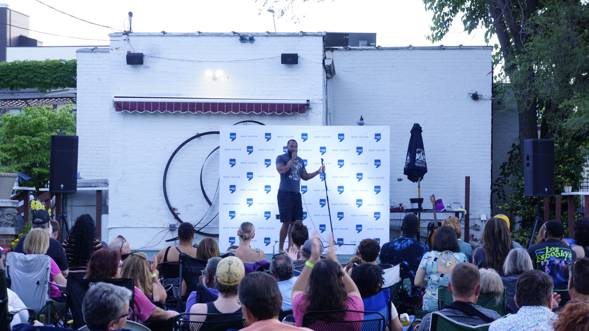 Josh Adams performing standup at WDET's "What's So Funny About Detroit?" comedy showcase in June 2022.