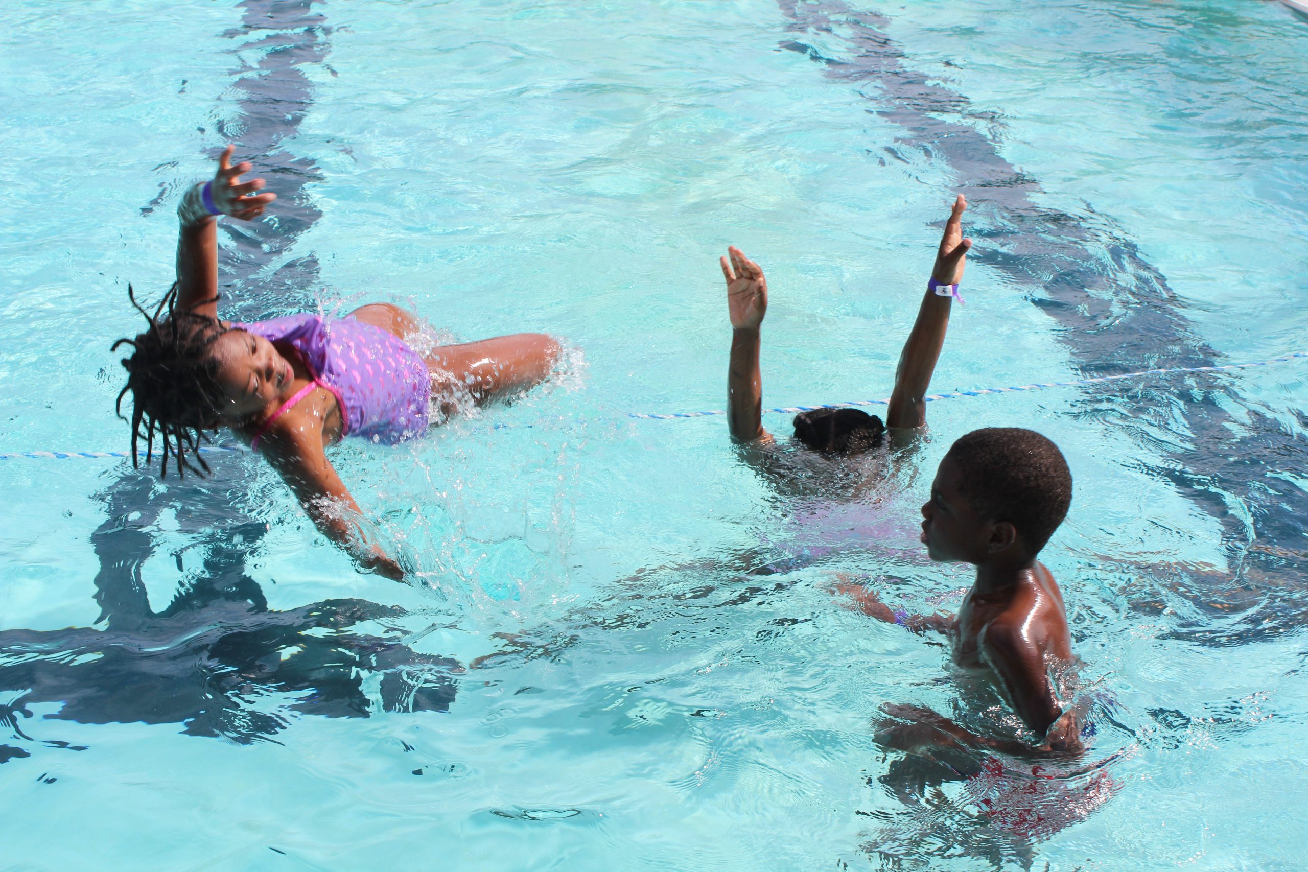 Children swim at Brennan pool.