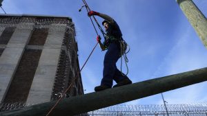 Prisoner Scott Steffes works on climbing at the Parnall Correctional Facility's Vocational Village in Jackson, Mich., Thursday, Dec. 1, 2022.