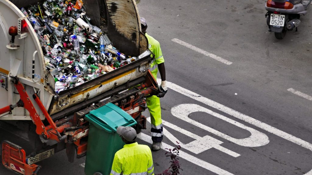 workers collect recycling waste