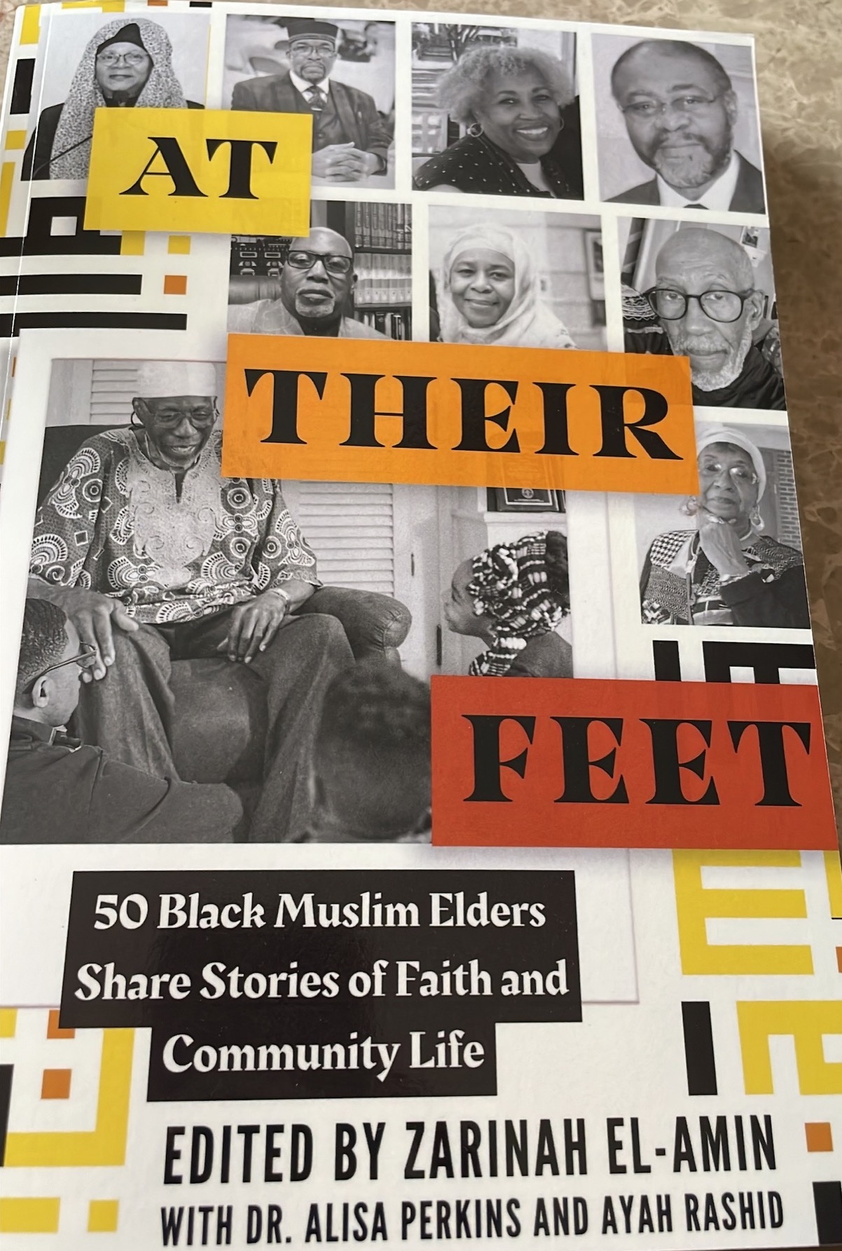 Cover of the book "At Their Feet."