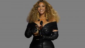 Beyonce accepts the award for best R&B performance for "Black Parade", 63rd annual Grammy Awards, Los Angeles Convention Center, graphic element on gray