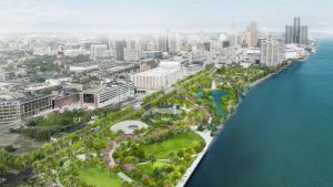A rendering of Detroit's Ralph C. Wilson Jr. Metropark. A vibrant, green park is on the edge of the West Riverfront and is surrounded by the city of Detroit.