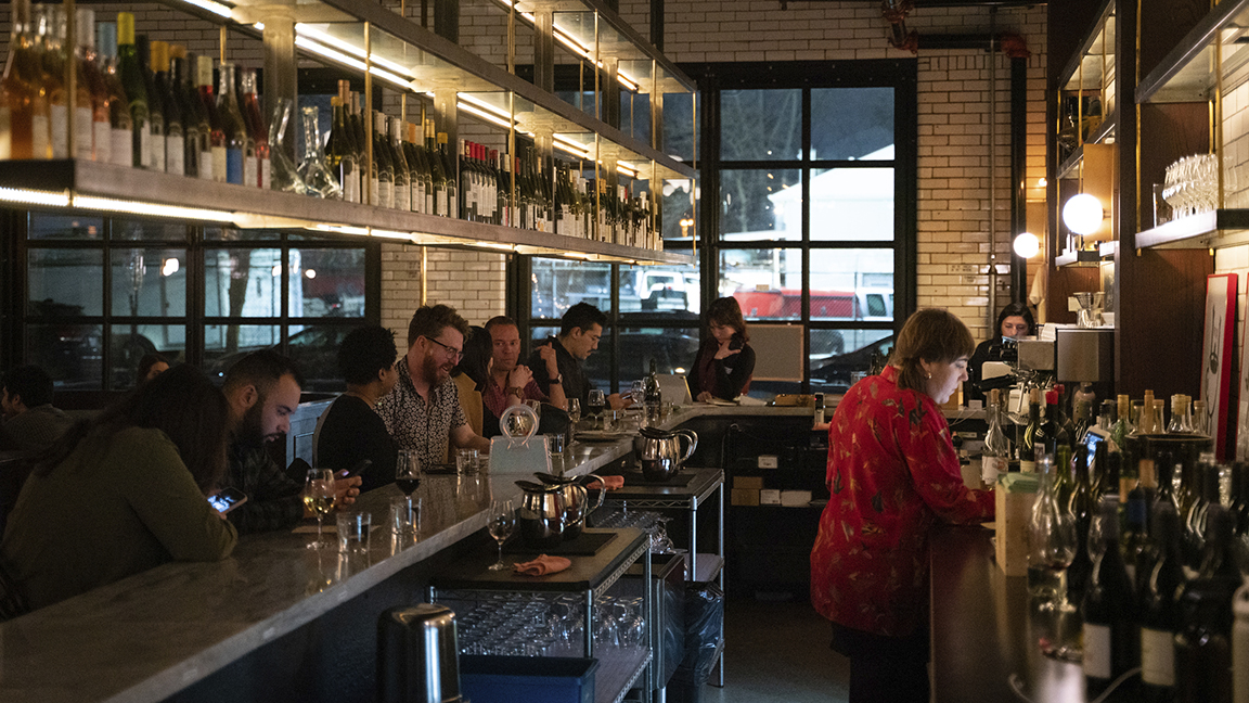 People dine at Ladder 4 Wine Bar, which was formerly a fire station in Detroit, Friday, Feb. 10, 2023.