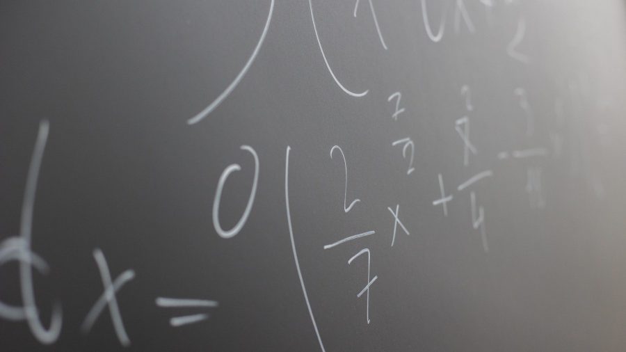 Stock photo of a math equation on a chalkboard.