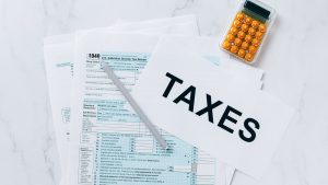 Stock photo of tax forms and calculator.