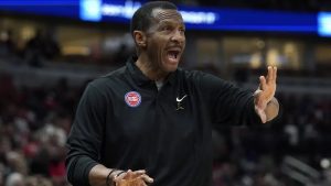 Detroit Pistons head coach Dwane Casey talks to his team during the first half of an NBA basketball game against the Chicago Bulls in Chicago, Sunday, April 9, 2023.