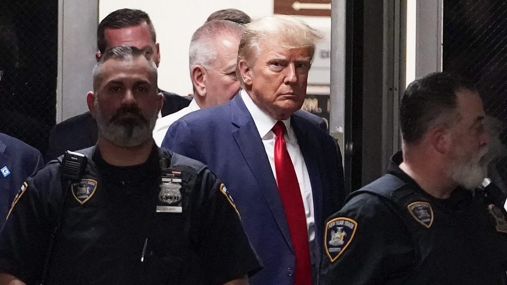 Former President Donald Trump arrives at court, Tuesday, April 4, 2023, in New York.