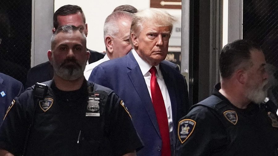 Former President Donald Trump arrives at court, Tuesday, April 4, 2023, in New York.