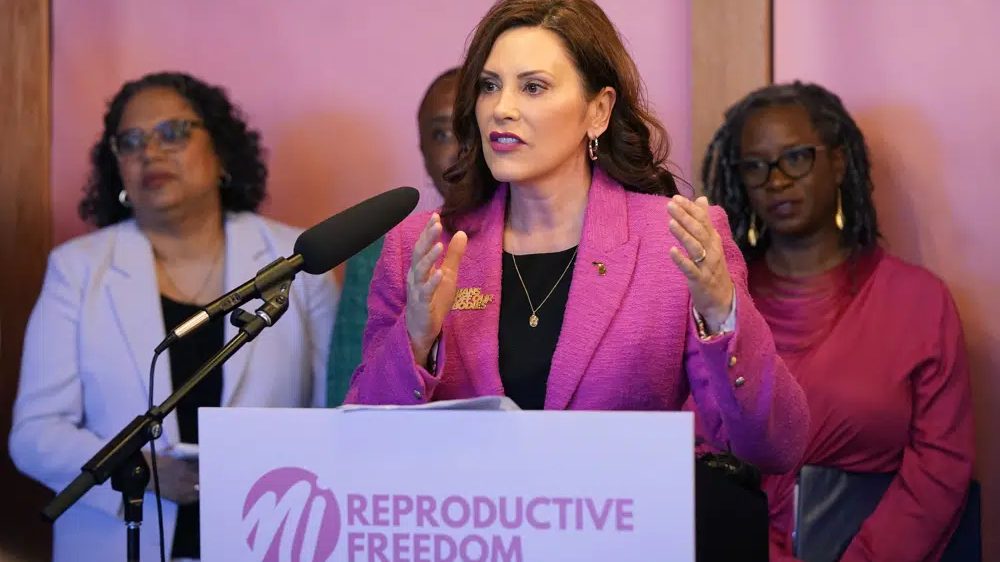 Michigan Gov. Gretchen Whitmer addresses supporters before signing legislation to repeal the 1931 abortion ban statute, which criminalized abortion in nearly all cases, during a bill signing ceremony on April 5, 2023, in Birmingham, Mich.