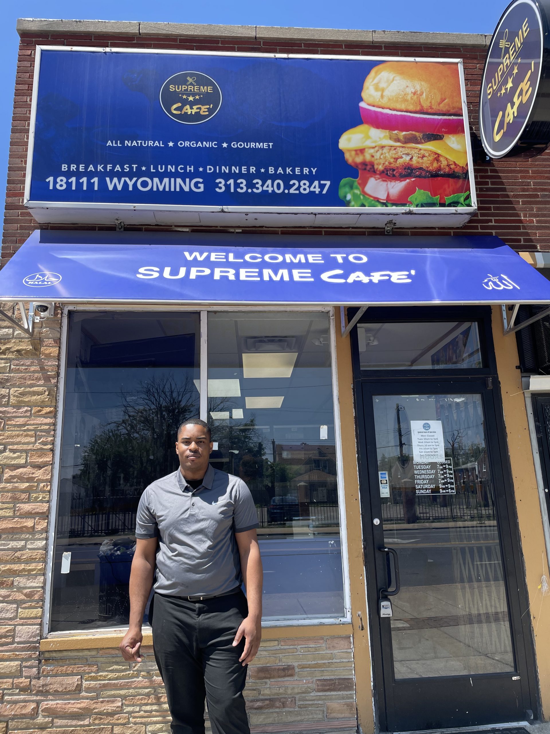 Jamaal Muhammad stands outside the Supreme Cafe