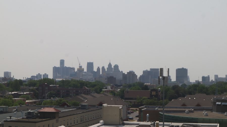 A photo of the Detroit skyline's reduced visibility due to poor air quality in Detroit, Mich. on June 7, 2023.