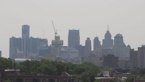 A photo of the Detroit skyline's reduced visibility due to poor air quality in Detroit, Mich. on June 7, 2023.