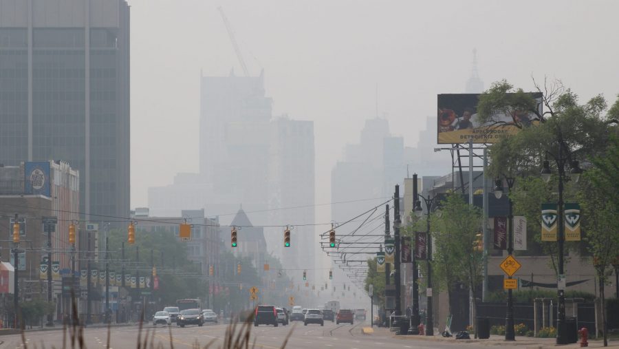 A photo of the Detroit skyline's reduced visibility due to poor air quality in Detroit, Mich. on June 28, 2023.