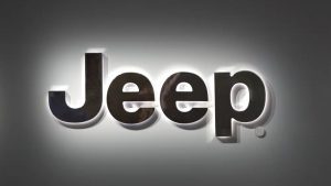 This Jan. 14, 2019 photo shows a Jeep logo at the North American International Auto Show in Detroit. (AP Photo/Paul Sancya, File)