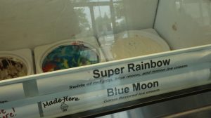Cartons of ice cream labeled "Super Rainbow" and "Blue Moon"