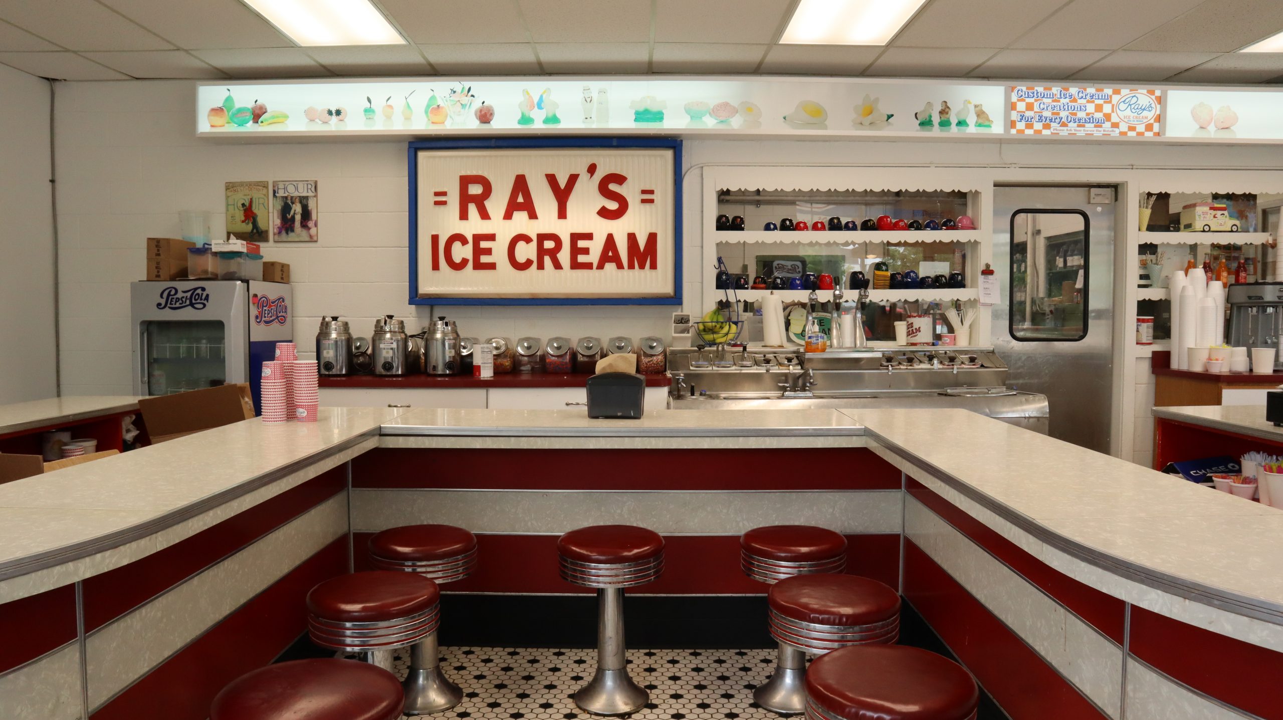 Interior of Ray's Ice Cream with 1950's-style red diner decor