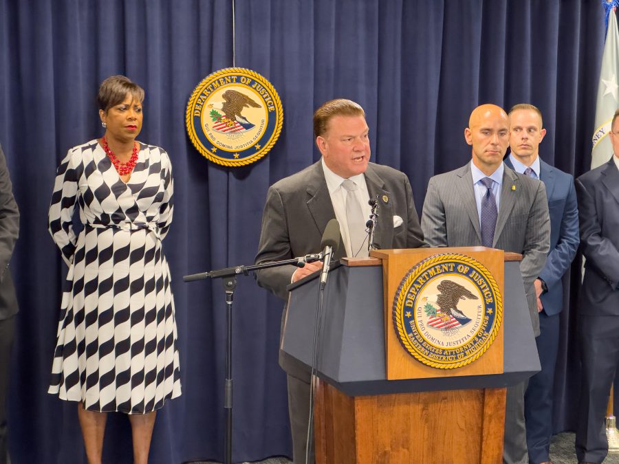 Macomb County Prosecutor Peter Lucido speaks at a news conference in downtown Detroit on July 10, 2023, announcing federal charges against a former Warren police officer.