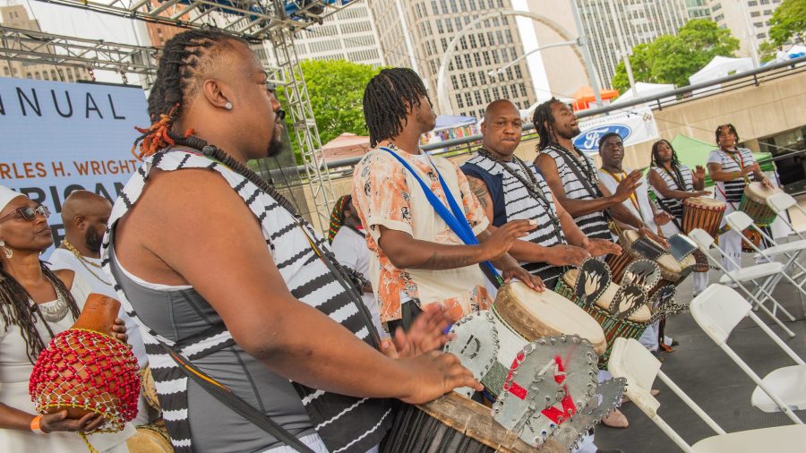 A line of drummers perform at the African World Festival
