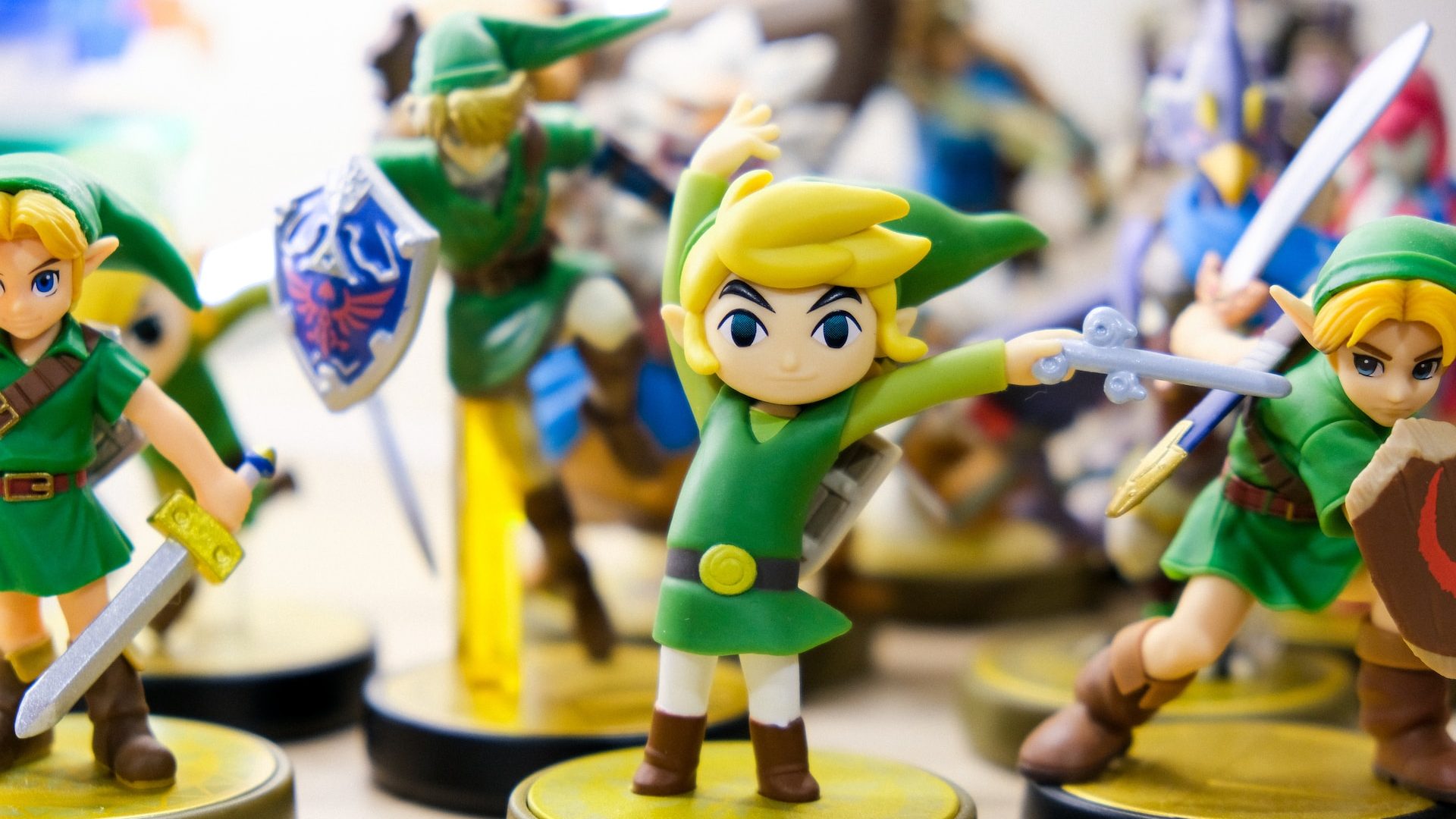 Nintendo amiibo toys of characters of Link from The Legend of Zelda Windwaker, Majors Mask, Ocarina of Time, and Super Smash Brothers