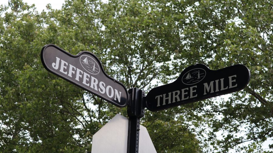 Street signs for the intersection of Jefferson and Three Mile Drive.