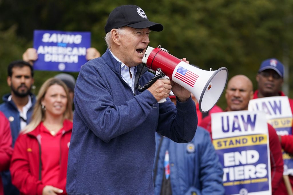 President Joe Biden joins striking United Auto Workers on the picket line, Tuesday, Sept. 26, 2023, in Van Buren Township, Mich.