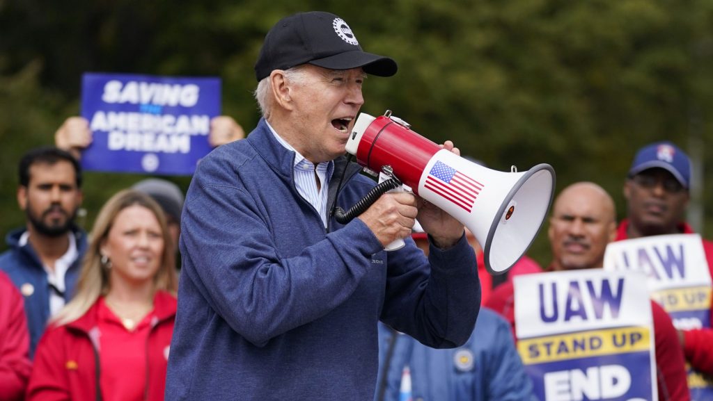 President Joe Biden joins striking United Auto Workers on the picket line, Tuesday, Sept. 26, 2023, in Van Buren Township, Mich.