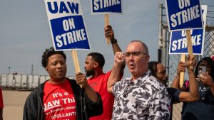 UAW President Shawn Fain walks the picket lines outside the Mopar plant in Center Line, Mich on Sept. 22, 2023.