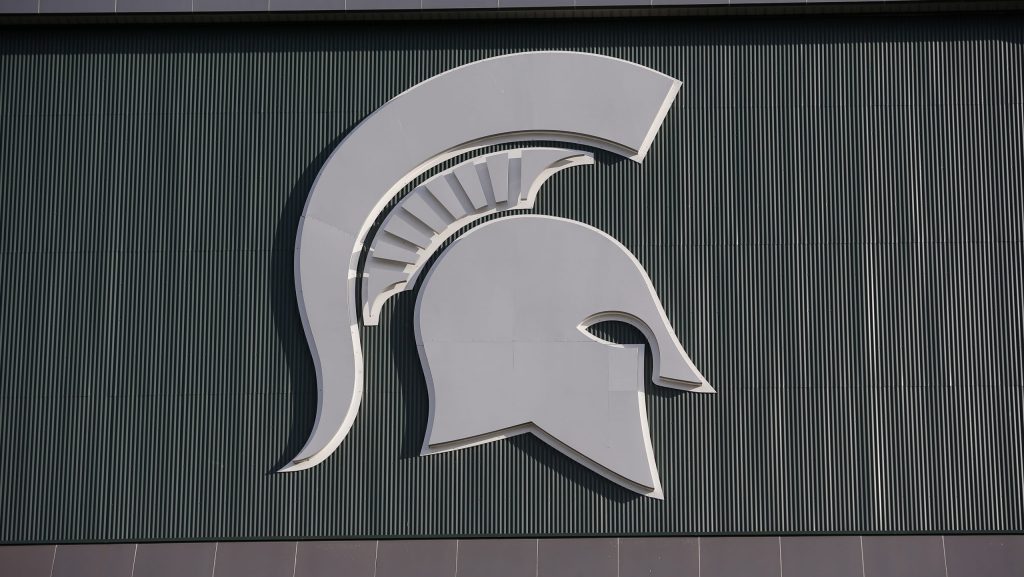 Michigan State's logo is seen on Spartan Stadium before the start of an NCAA college football game between Michigan State and Tulsa, Friday, Aug. 30, 2019, in East Lansing, Mich.