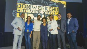 Big Sean poses with his mother and Detroit representatives at DON Weekend 2023