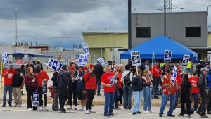 UAW members picket outside of Ford's Michigan Assembly Plant in Wayne, Mich.
