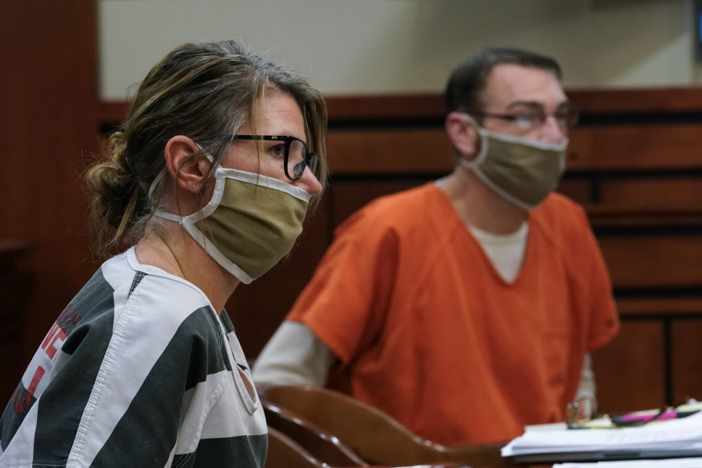 FILE - In this Feb. 8, 2022, photo, Jennifer and James Crumbley, the parents of Ethan Crumbley, a teenager accused of killing four students in a shooting at Oxford High School, appear in court in Rochester Hills, Mich.