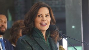“Pessimism is pointless,” said Gov. Gretchen Whitmer as she prepared to sign the legislation to enact Michigan’s new climate law. Critics say it seizes power from local governments to regulate solar farms and wind turbines.