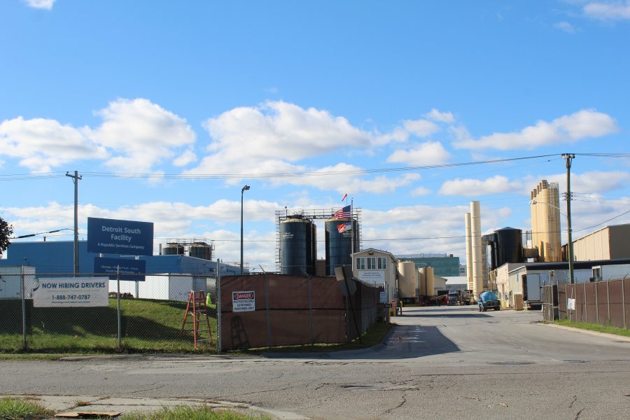 Image depicts an entrance to US Ecology South, a hazardous waste processing facility in Detroit. It's an industrial plant with a few towers.