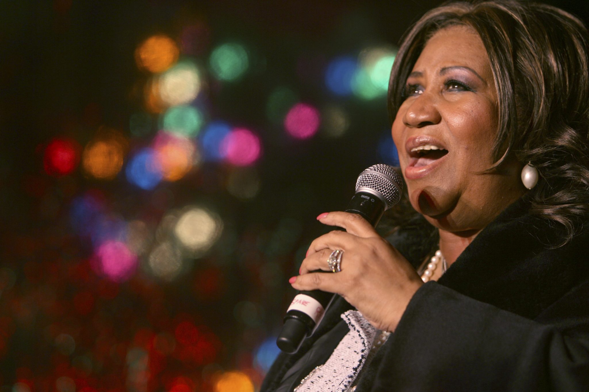 FILE - In this Dec. 4, 2008 file photo, Aretha Franklin performs during the 85th annual Christmas tree lighting at the New York Stock Exchange in New York.