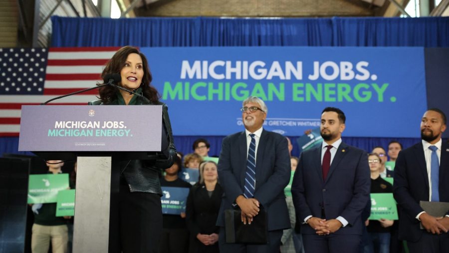 Whitmer declared herself “a climate optimist” as she signed the 11-bill clean energy package at Detroit’s Eastern Market on Nov. 28, 2023.